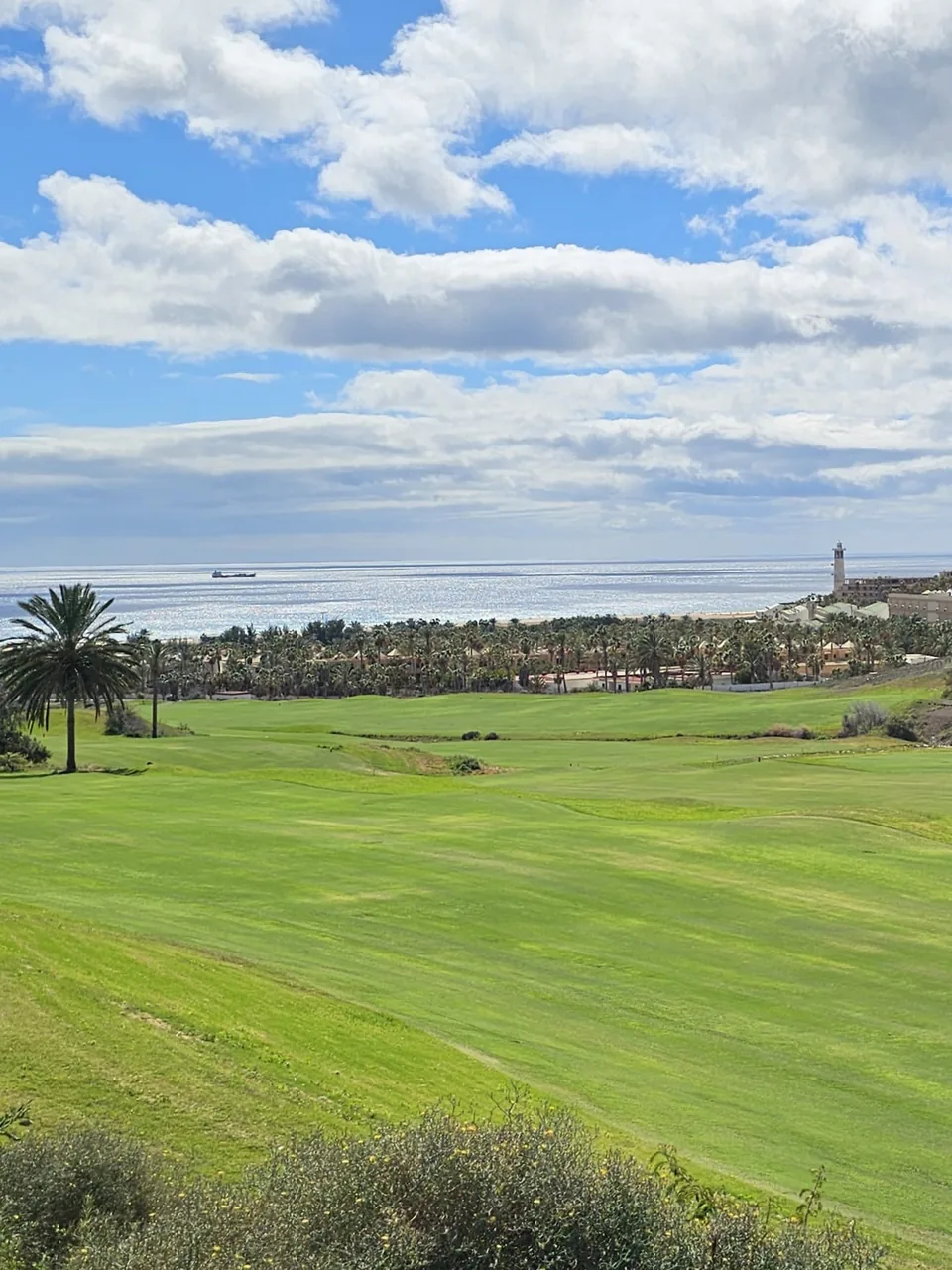 Fairways beneath a cloudy sky