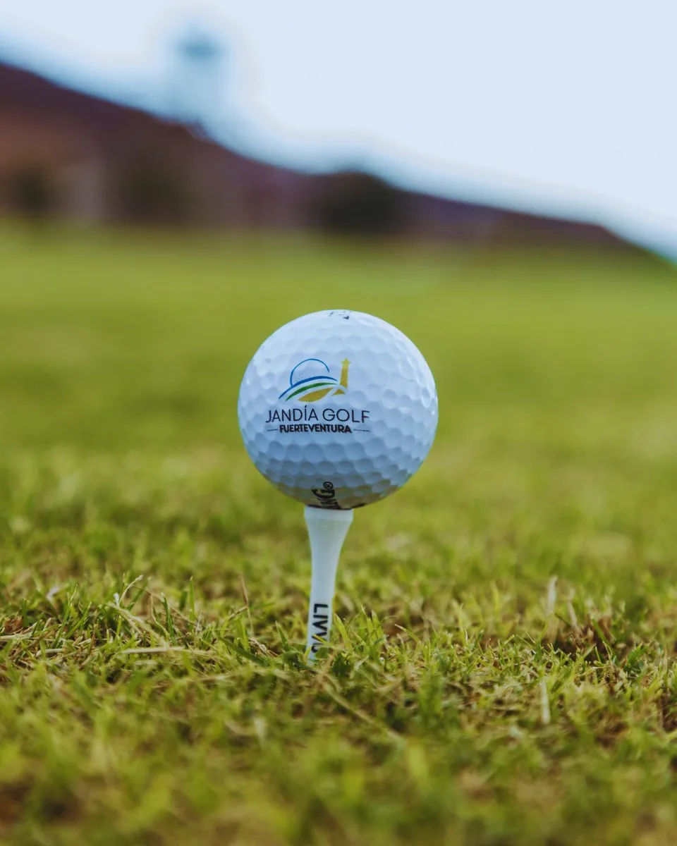 Jandía Golf branded ball on a tee